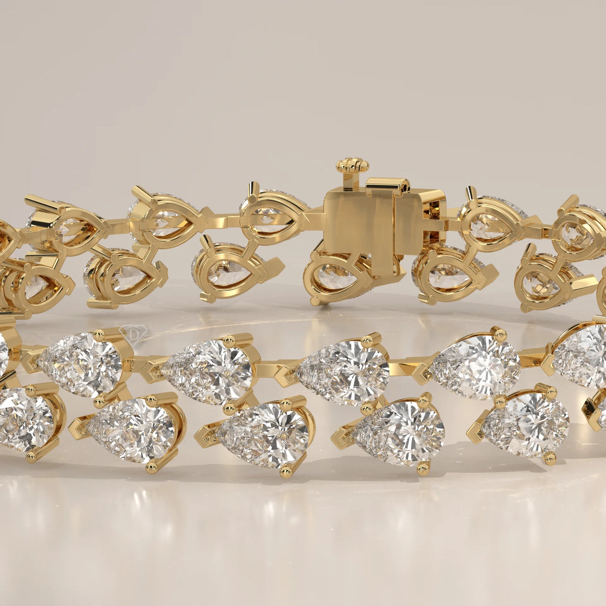 Double Row Tilted Pear Lab Grown Diamond Tennis Bracelet in yellow gold, front view on a plain background.