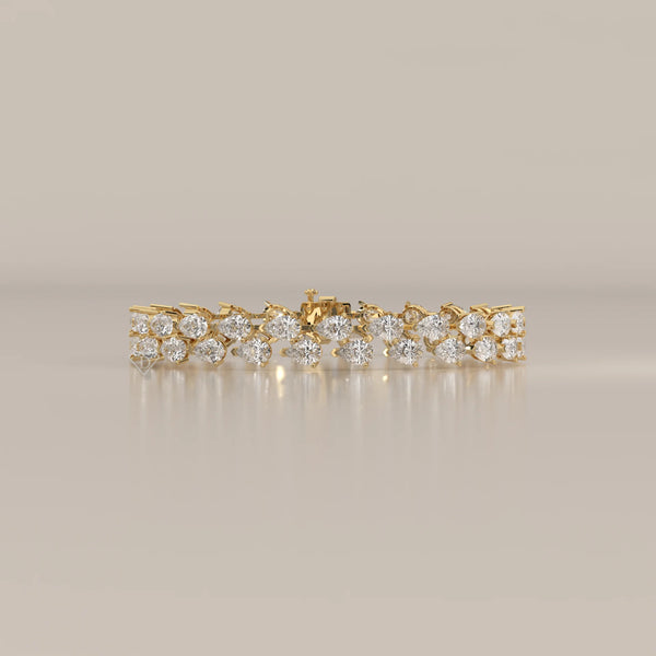 Double Row Tilted Pear Lab Grown Diamond Tennis Bracelet in yellow gold, shown from the front.