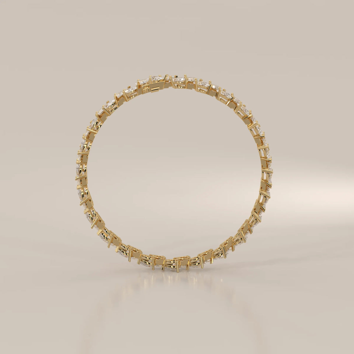 Double Row Tilted Pear Lab Grown Diamond Tennis Bracelet in yellow gold, shown from the side.