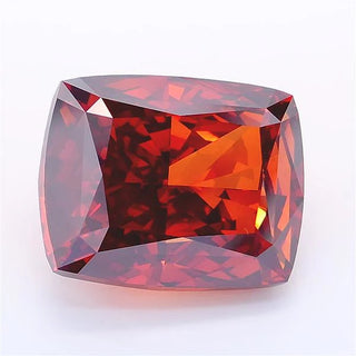 Cushion cut deep orangy brown lab grown diamond with an IGI certification.