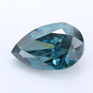 Pear cut vivid green blue lab grown diamond with brilliant facets on a white background.