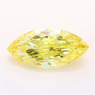 Marquise cut intense yellow lab grown diamond with IGI certification inscription.