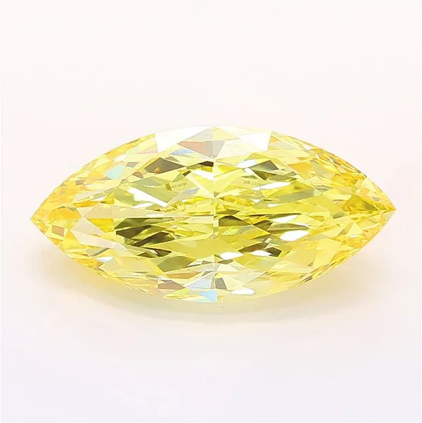 Marquise cut intense yellow lab grown diamond with IGI certification inscription.