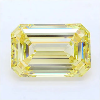 Emerald cut intense yellow lab grown diamond with step-cut facets and high clarity.