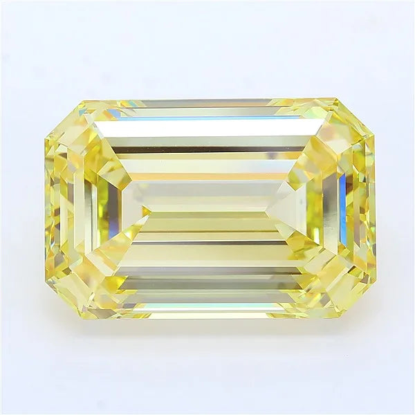 Emerald cut intense yellow lab grown diamond with step-cut facets and high clarity.