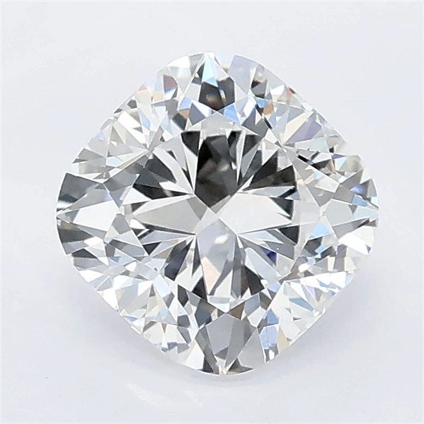 Top-down view of a cushion cut lab grown diamond with brilliant facets on a white background.