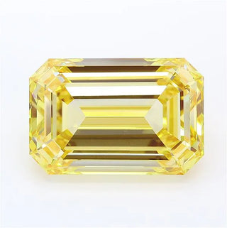 Emerald cut intense yellow lab grown diamond with step-cut facets and IGI certification.