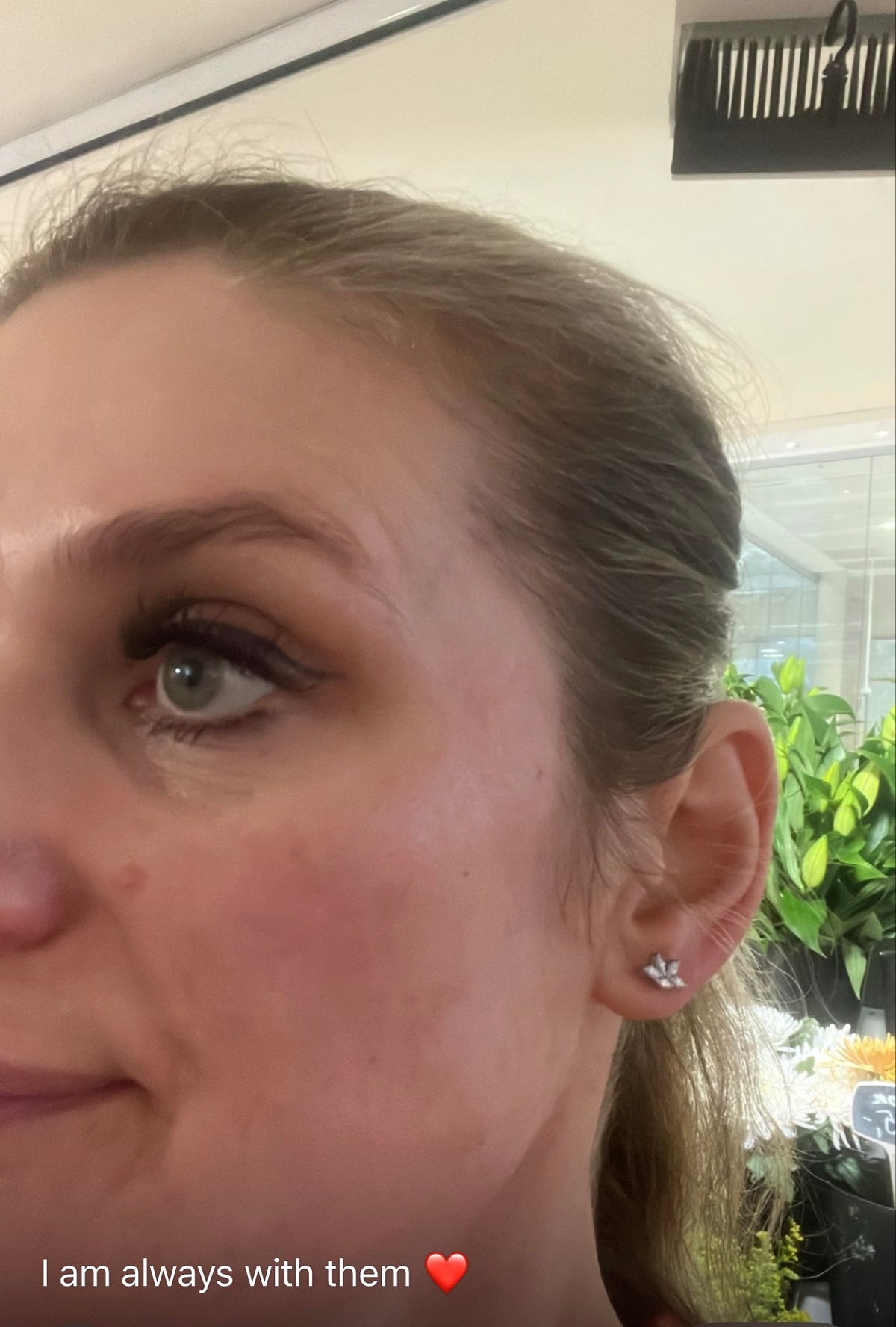 Customer wearing marquise flower cluster lab grown diamond stud earrings from Driona Jewels