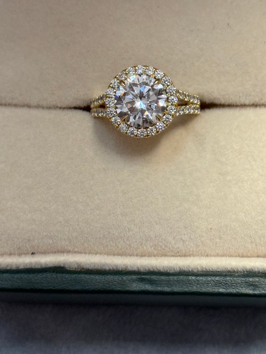 Round halo split shank lab grown diamond engagement ring in a Driona Jewels ring box