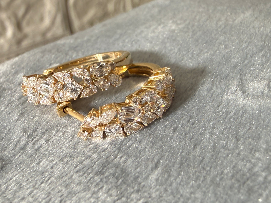 Yellow gold hoop earrings set with mixed cut lab grown diamonds from Driona Jewels