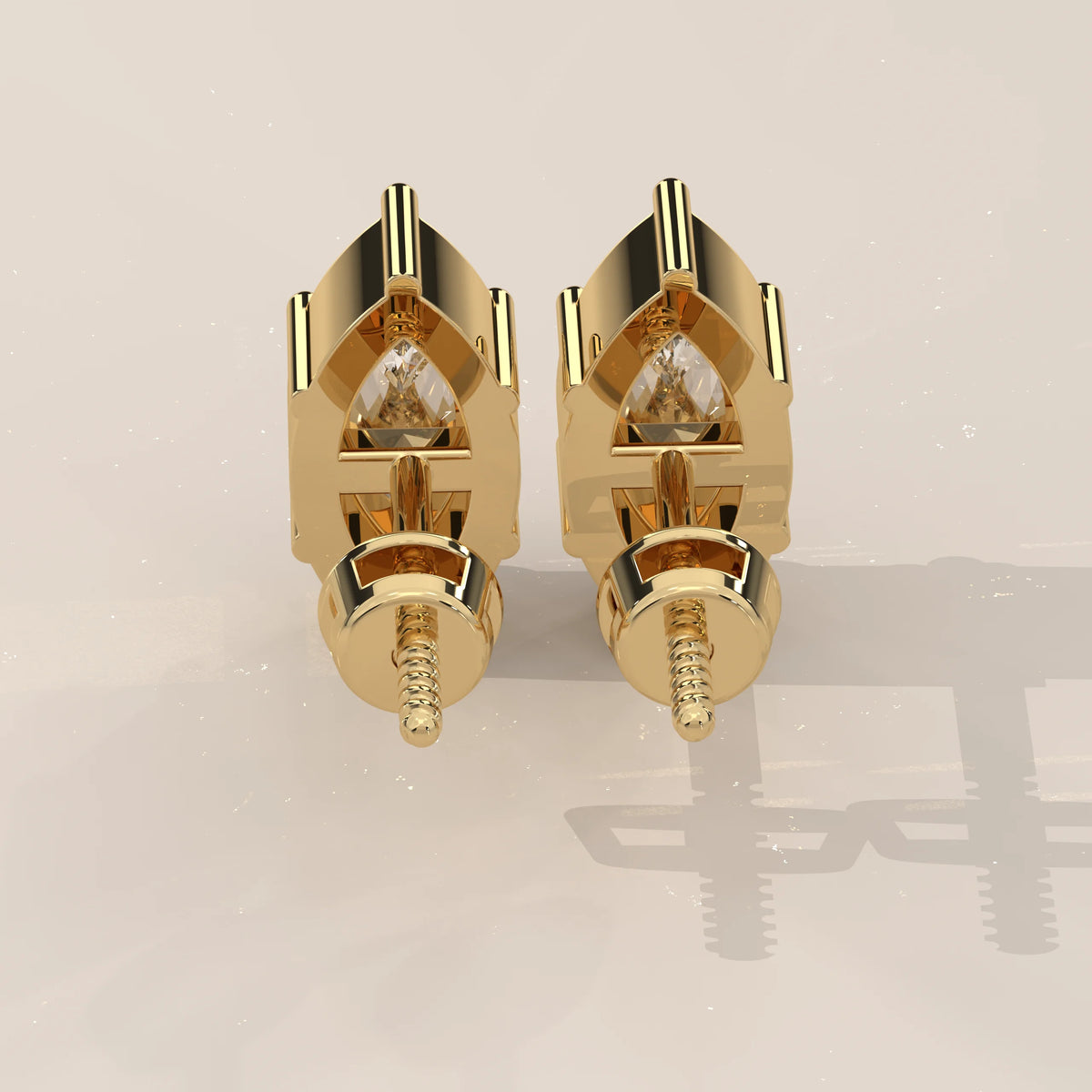 A pair of 14k gold stud earrings with diamonds, shown from the front.