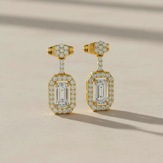 Flat Lay: Emerald Cut Diamond Earrings with Halo Setting in 14k Yellow Gold - Lab Grown - Driona Jewels