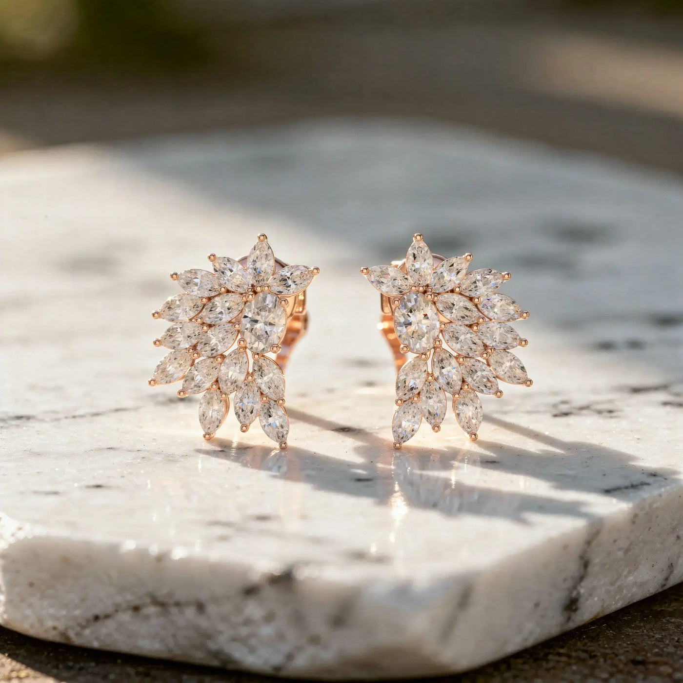 Flat Lay: Marquise Diamond Earrings with Cluster Setting in 14k Rose Gold - Lab Grown - Driona Jewels