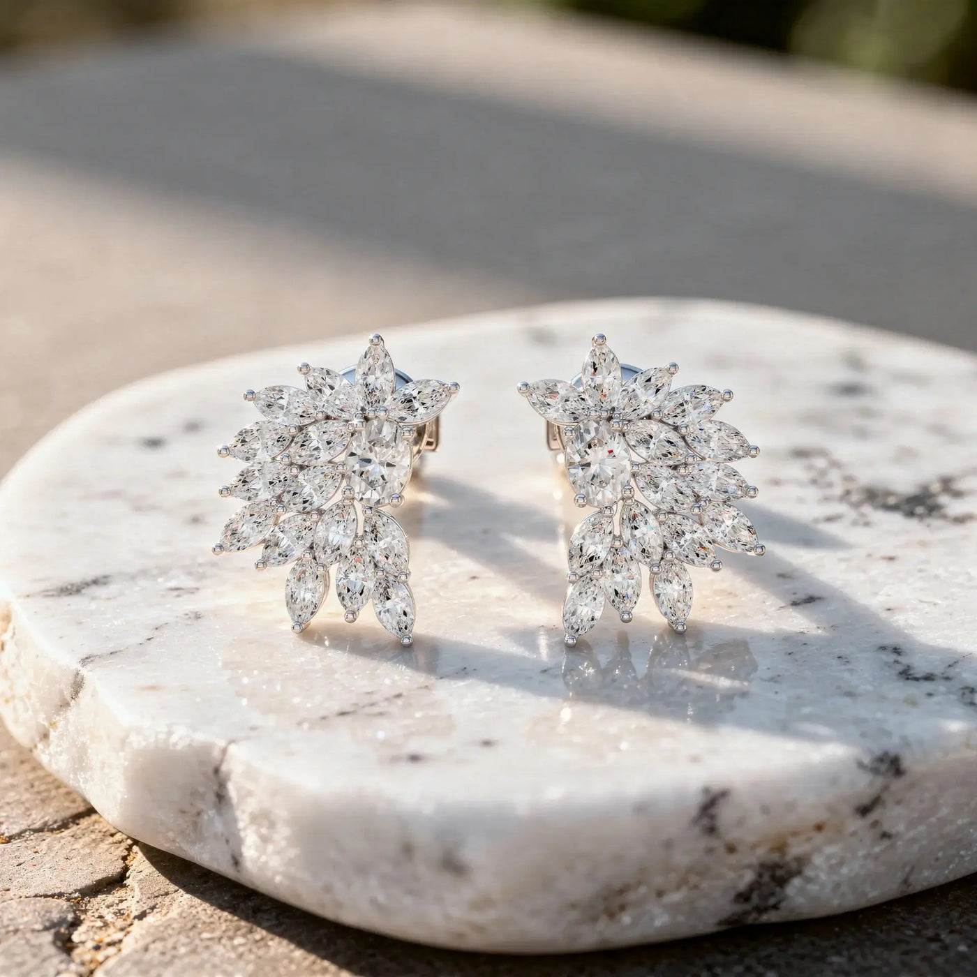 Flat Lay: Marquise Diamond Earrings with Cluster Setting in 14k White Gold - Lab Grown - Driona Jewels