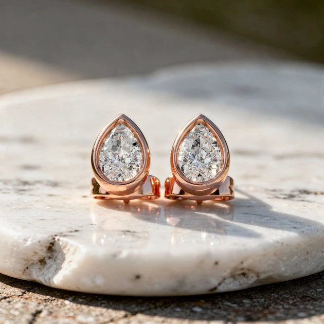 Pair-shot: Pear Diamond Earrings with Bezel Setting in 14k Rose Gold - Lab Grown - Driona Jewels