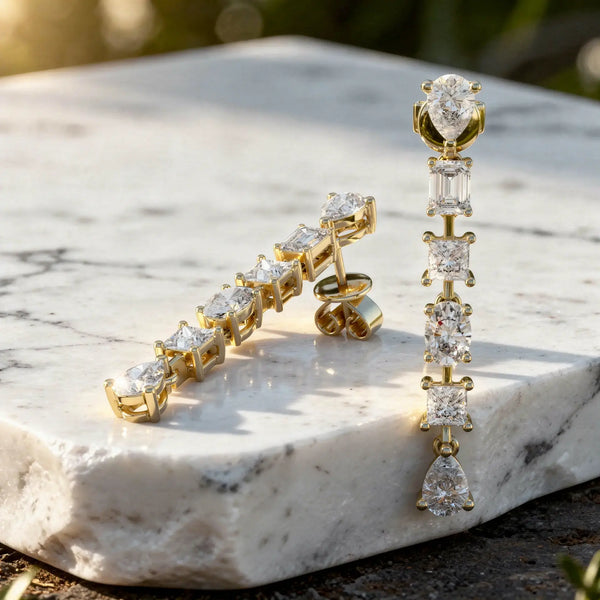Flat Lay: Princess Diamond Earrings with Drop Setting in 14k Yellow Gold - Lab Grown - Driona Jewels