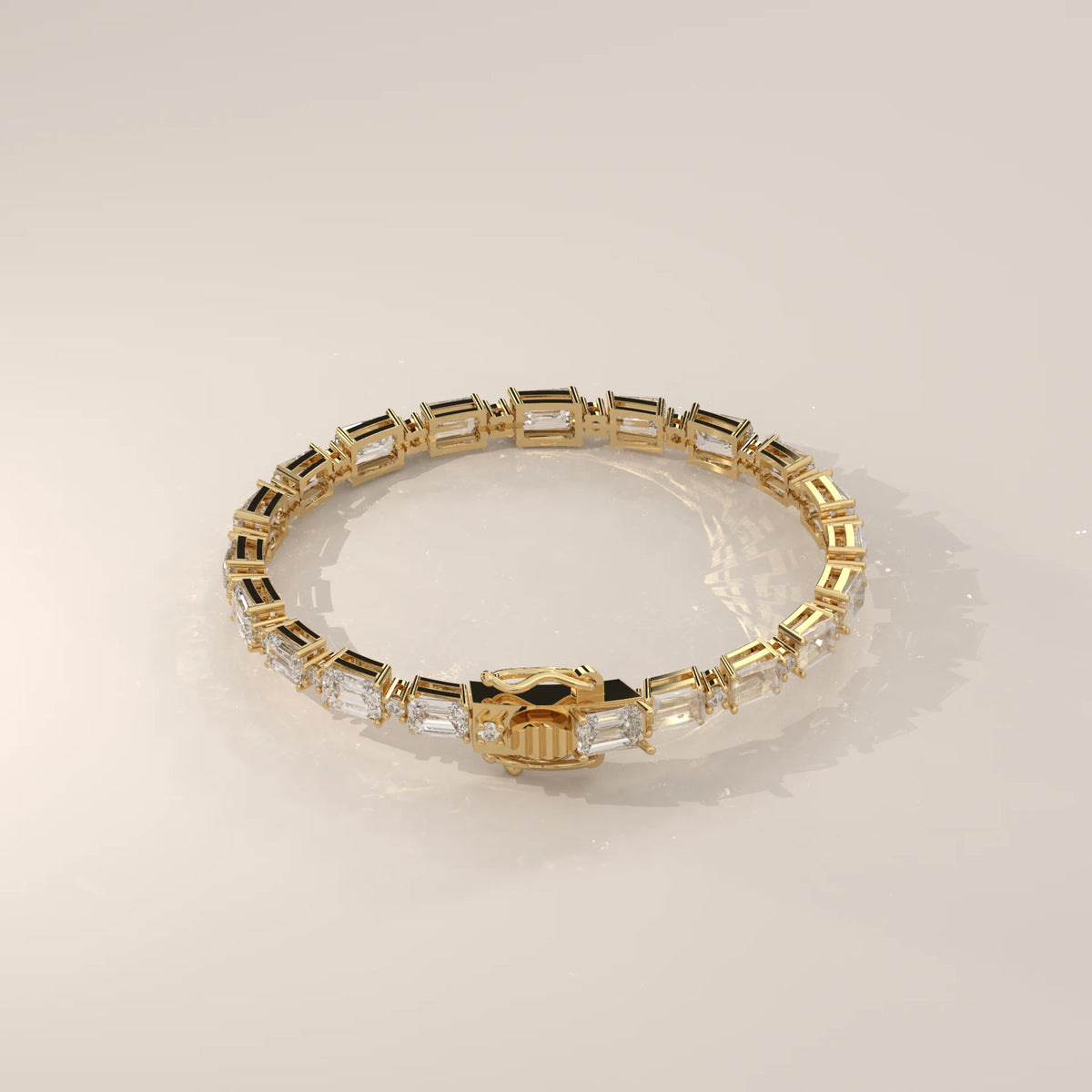 East West Emerald Cut Lab Grown Diamond Bracelet with Round Accents in yellow gold, shown on a plain background.