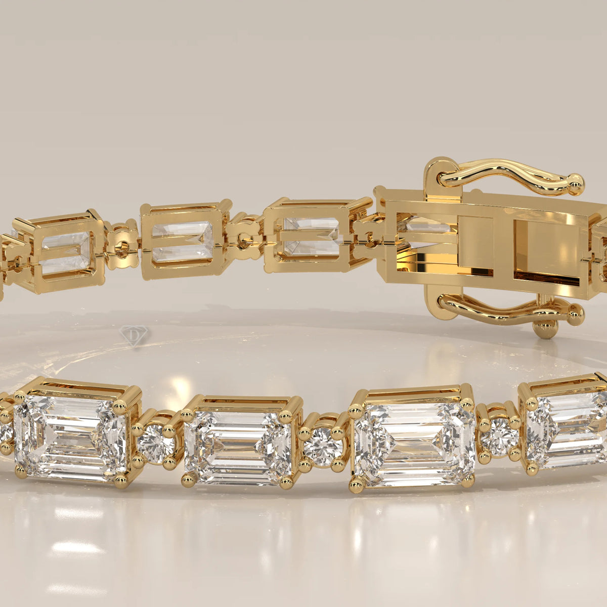 East West Emerald Cut Lab Grown Diamond Bracelet with Round Accents in yellow gold, product photograph on a plain background.