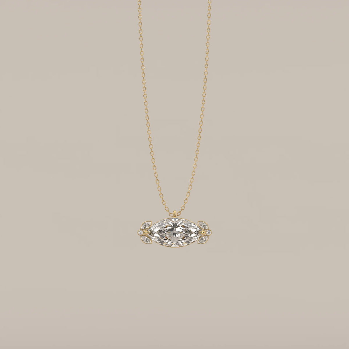 East West Marquise Lab Grown Diamond Pendant with Leaf Clusters in yellow gold, shown from the front.