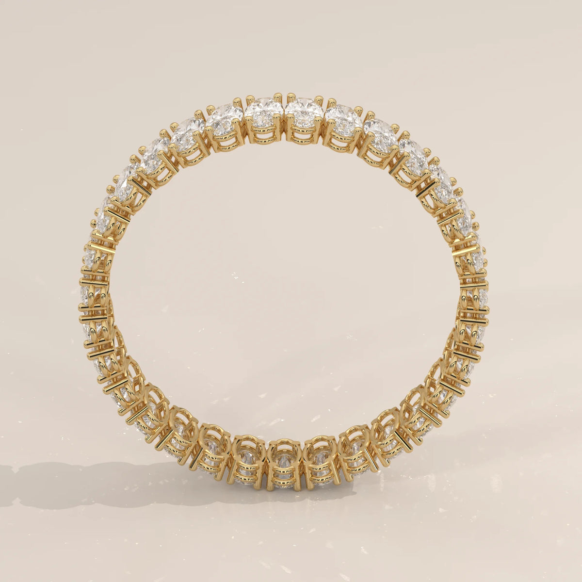 East West Oval Cut Lab Grown Diamond Full Eternity Band in yellow gold, studio photograph on a plain background.