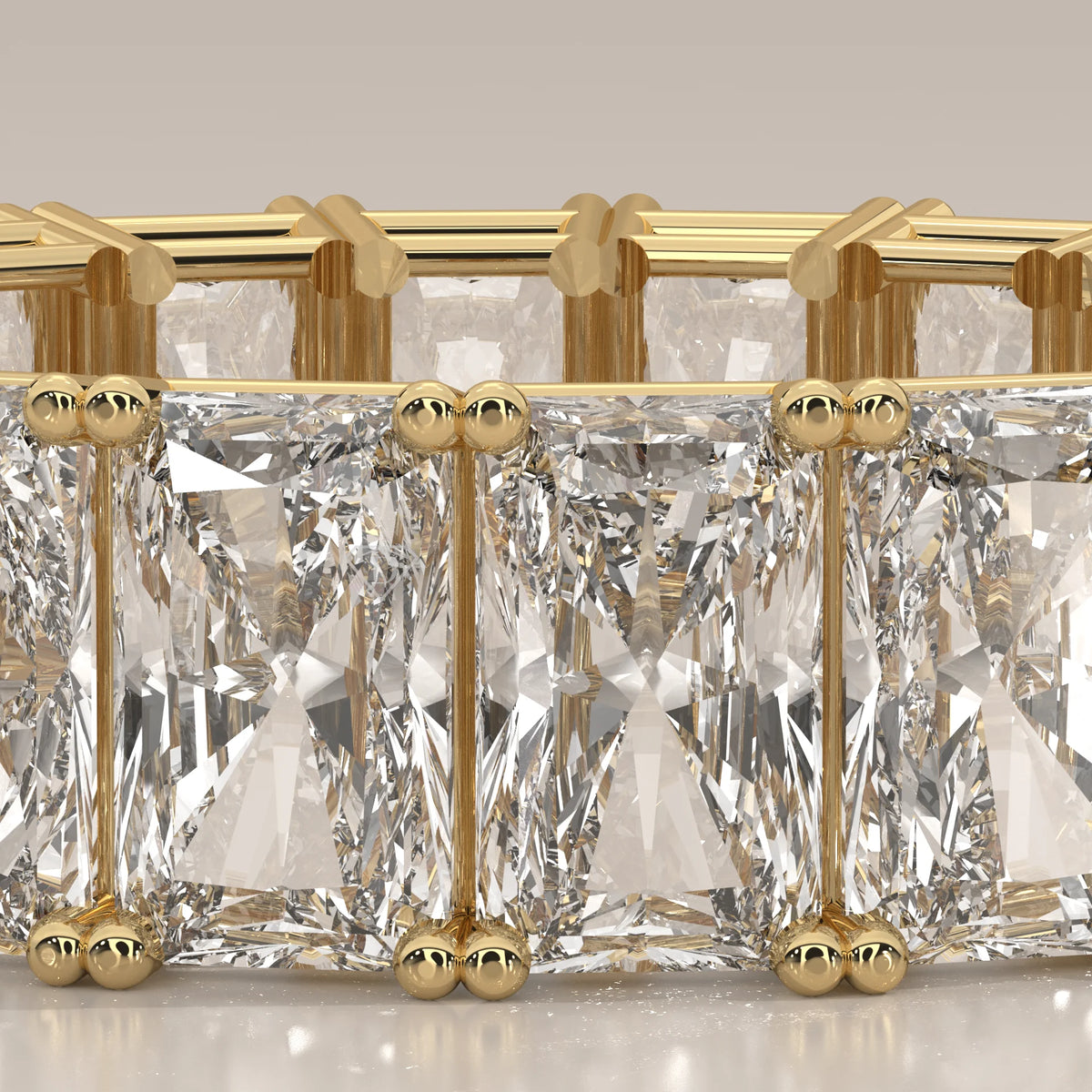 Elongated Radiant Cut Diamond Eternity Band Set East West in yellow gold, photographed head-on.