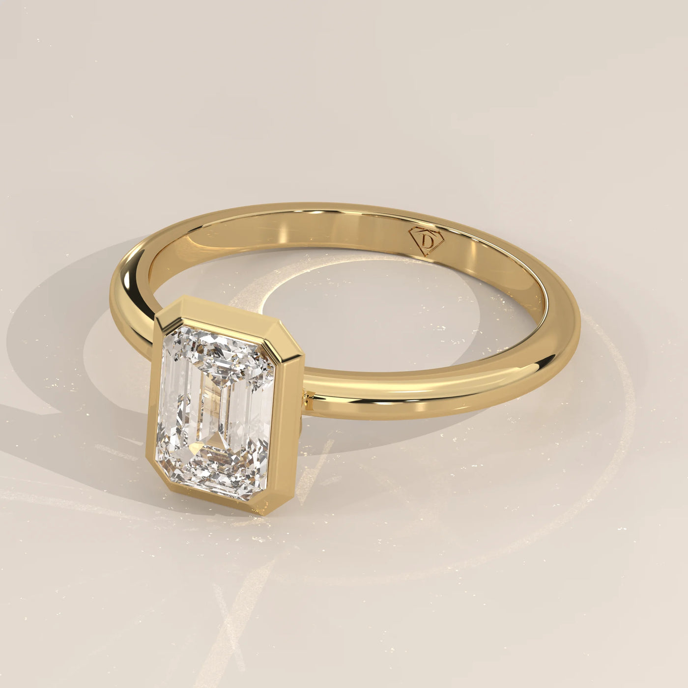Angle View: Emerald Cut Diamond Ring with Bezel Setting in Yellow Gold – Lab Grown – Driona Jewels