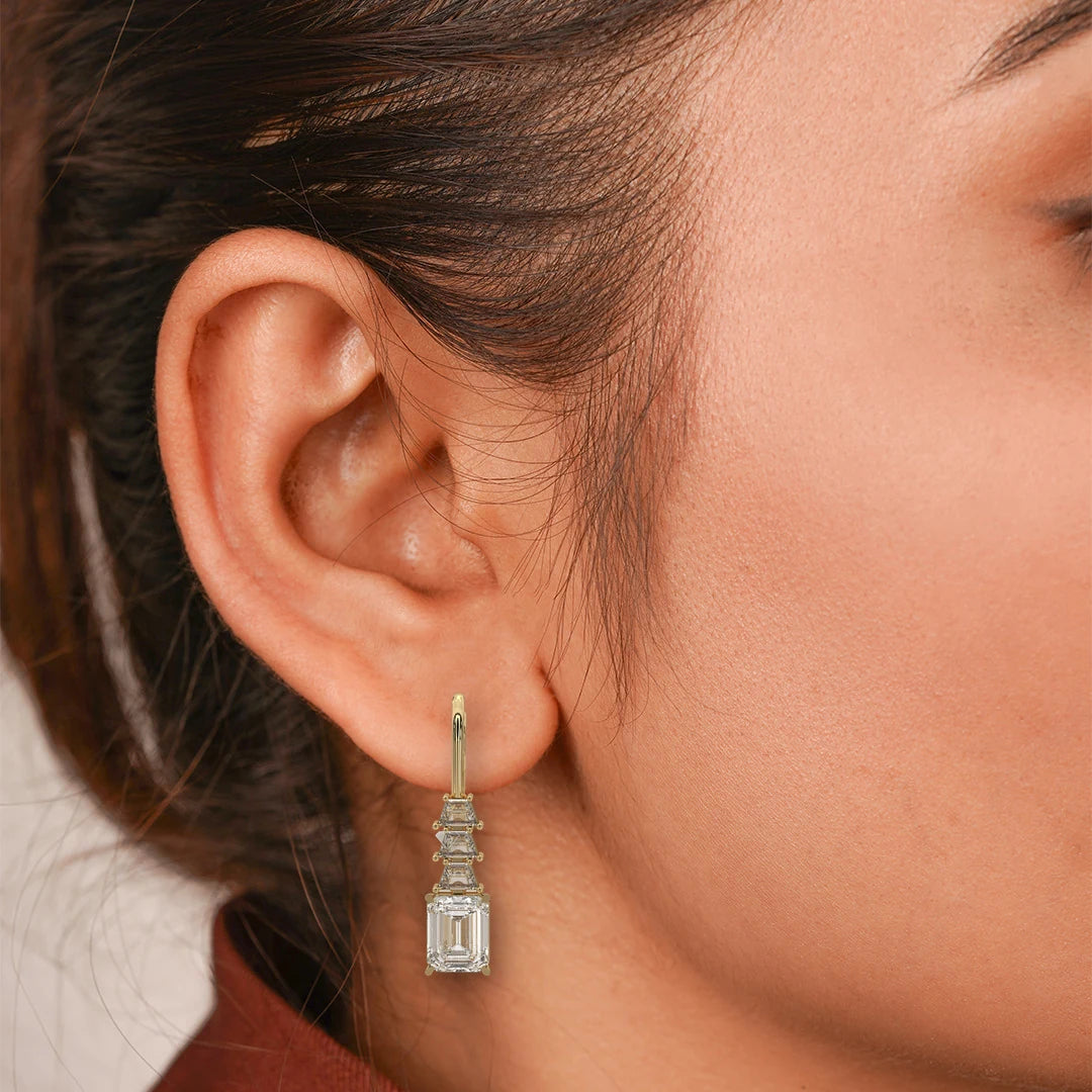 On Model: Emerald Cut Diamond Drop Earrings with Prong Setting in Yellow Gold – Lab Grown – Driona Jewels