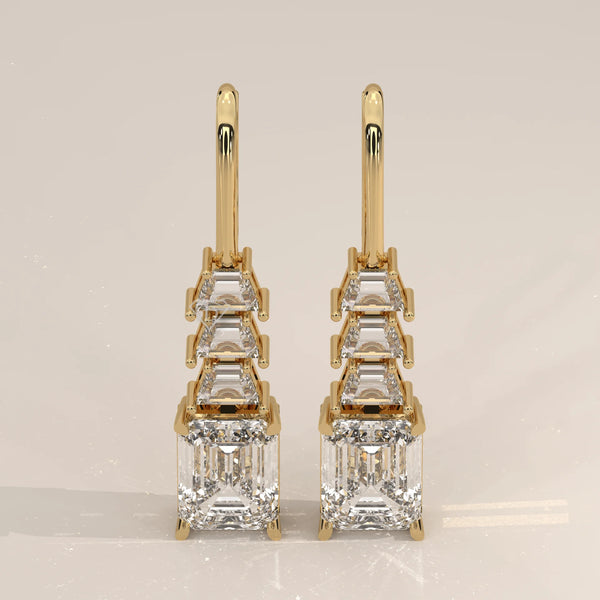 Pair Front View: Emerald Cut Diamond Drop Earrings with Prong Setting in Yellow Gold – Lab Grown – Driona Jewels