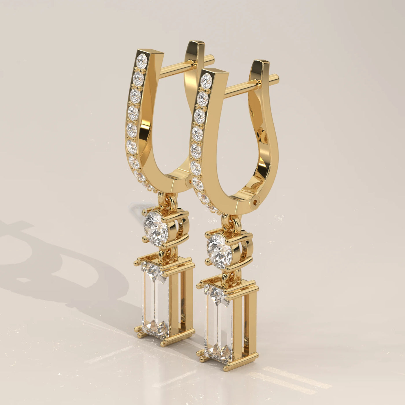 Three-Quarter View: Emerald Cut Diamond Drop Earrings with Pavé Setting in Yellow Gold – Lab Grown – Driona Jewels