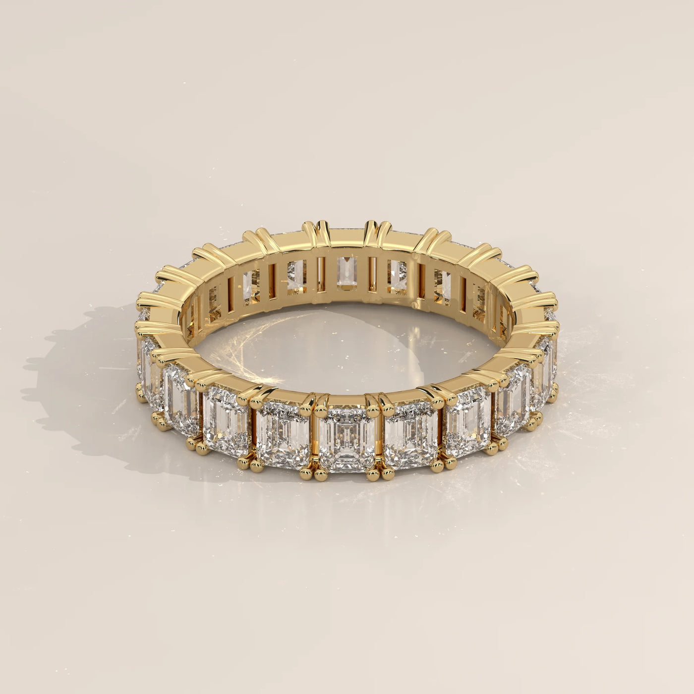 Three-Quarter View: Emerald Cut Diamond Eternity Band with Eternity Setting in Yellow Gold – Lab Grown – Driona Jewels