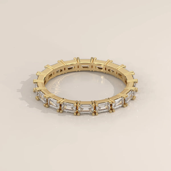 Three-Quarter View: Emerald Cut Diamond Eternity Band with Eternity Setting in Yellow Gold – Lab Grown – Driona Jewels