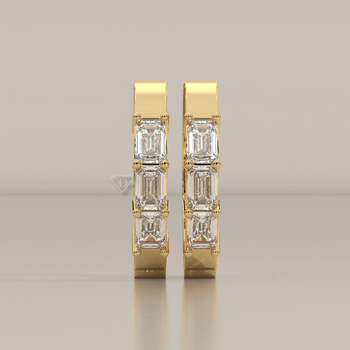 Front View: Emerald Cut Diamond Huggie Hoop Earrings with Prong Setting in Yellow Gold – Lab Grown – Driona Jewels