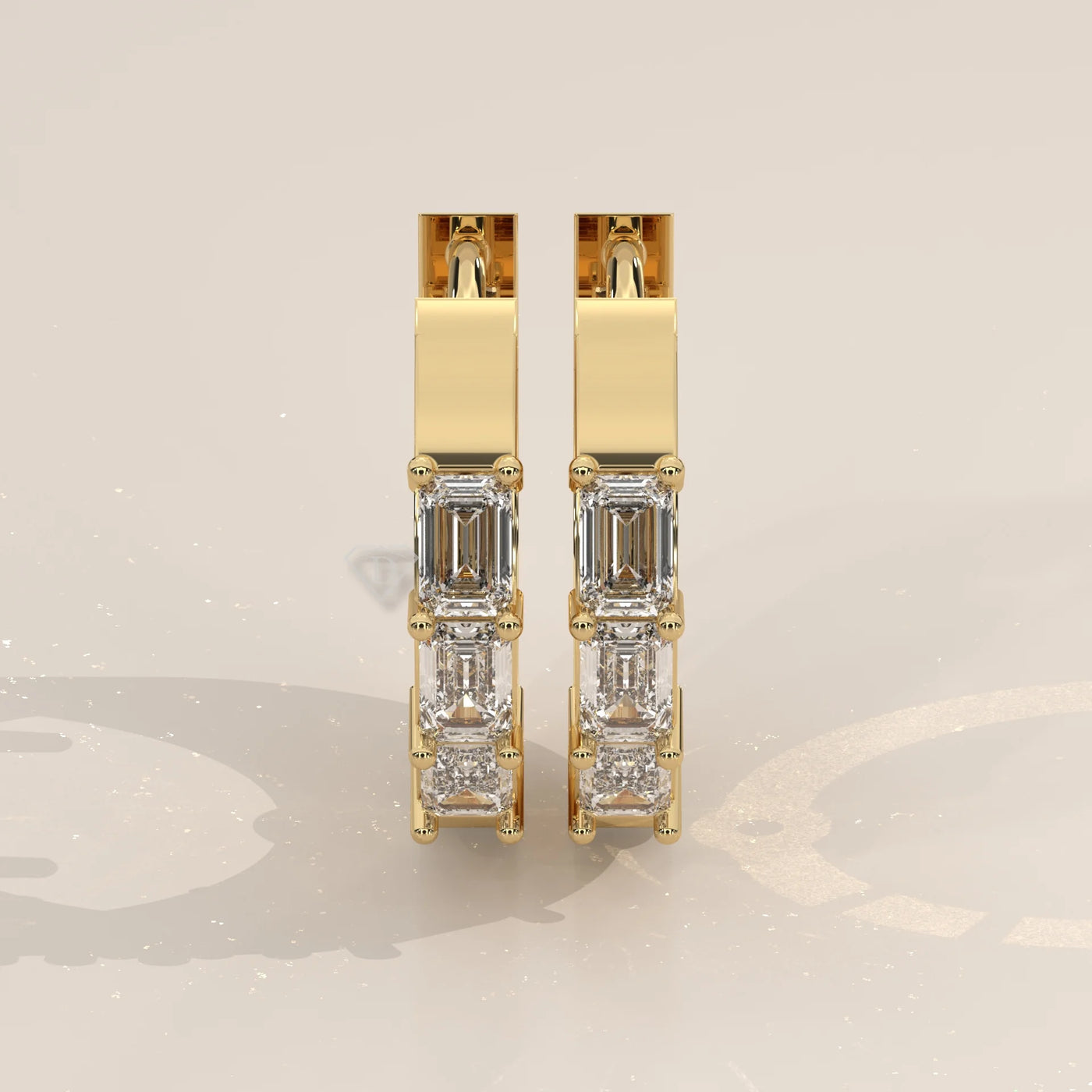 Pair Front View: Emerald Cut Diamond Huggie Hoop Earrings with Prong Setting in Yellow Gold – Lab Grown – Driona Jewels