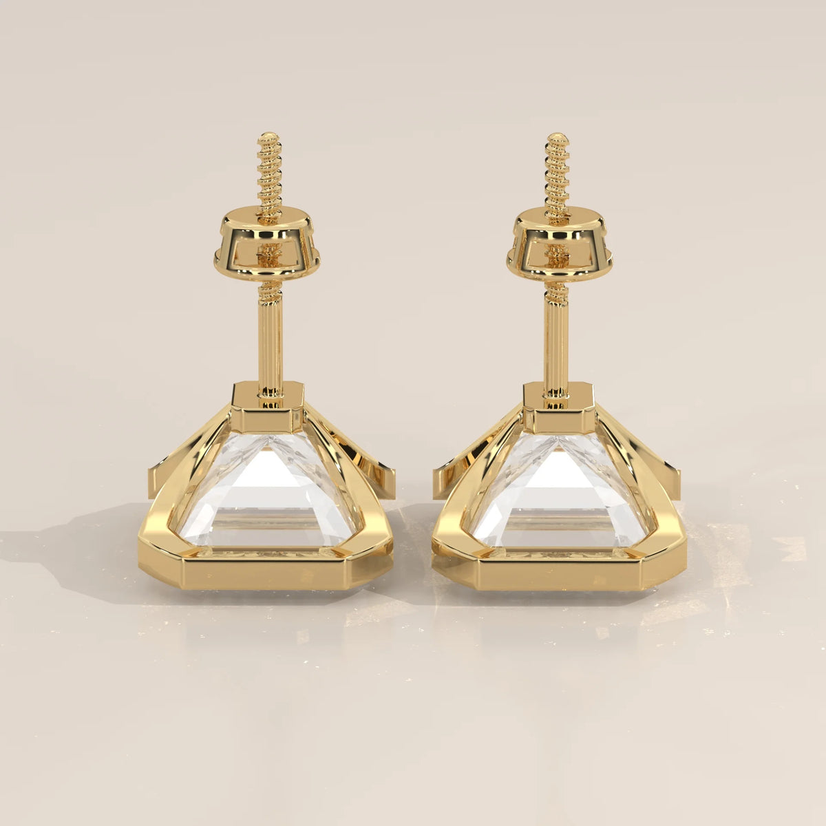 Emerald Cut Partial Bezel Lab Grown Diamond Stud Earrings in yellow gold, shown on a plain background.