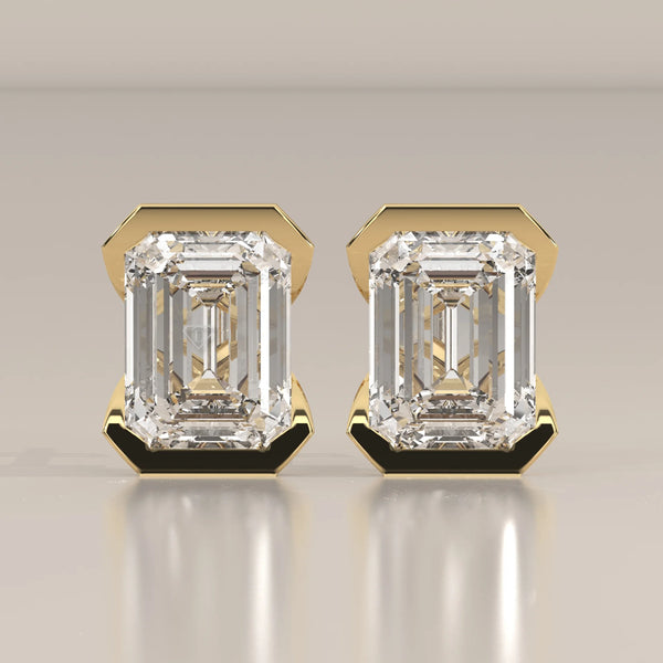 Emerald Cut Partial Bezel Lab Grown Diamond Stud Earrings in yellow gold, shown from the front.