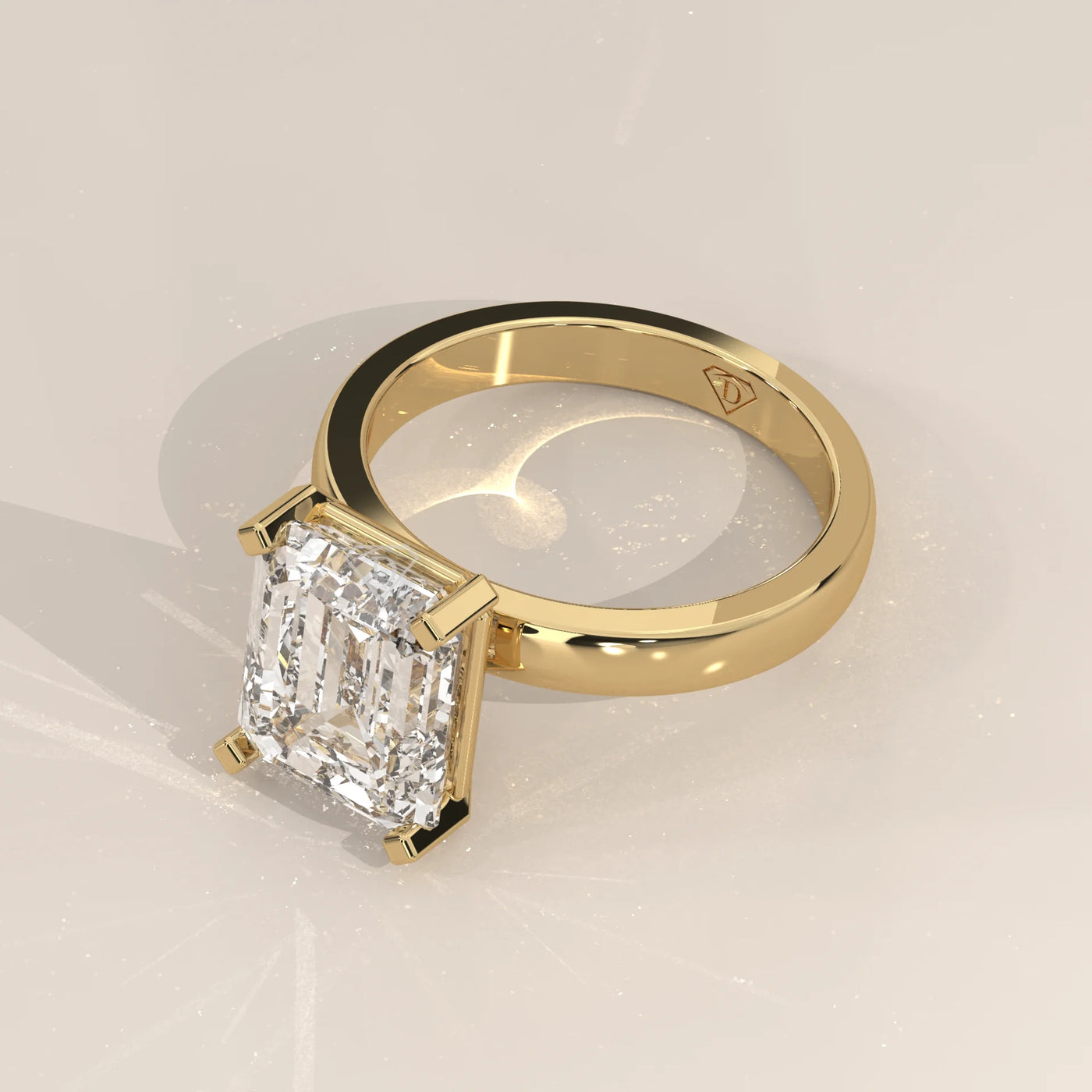Angle View: Emerald Cut Diamond Engagement Ring with Solitaire Setting in Yellow Gold – Lab Grown – Driona Jewels