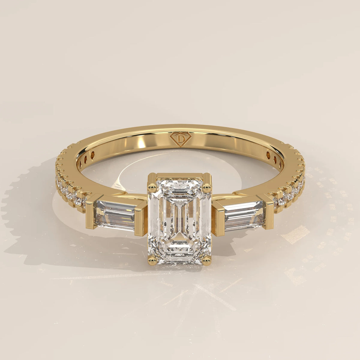 Three-Quarter View: Emerald Cut Diamond Ring with Three-Stone Setting in Yellow Gold – Lab Grown – Driona Jewels