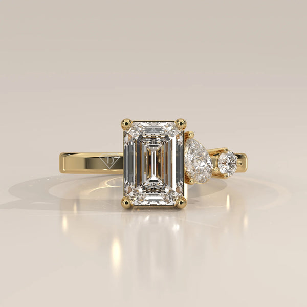 Side Profile: Emerald Cut Diamond Ring with Three-Stone Setting in Yellow Gold – Lab Grown – Driona Jewels