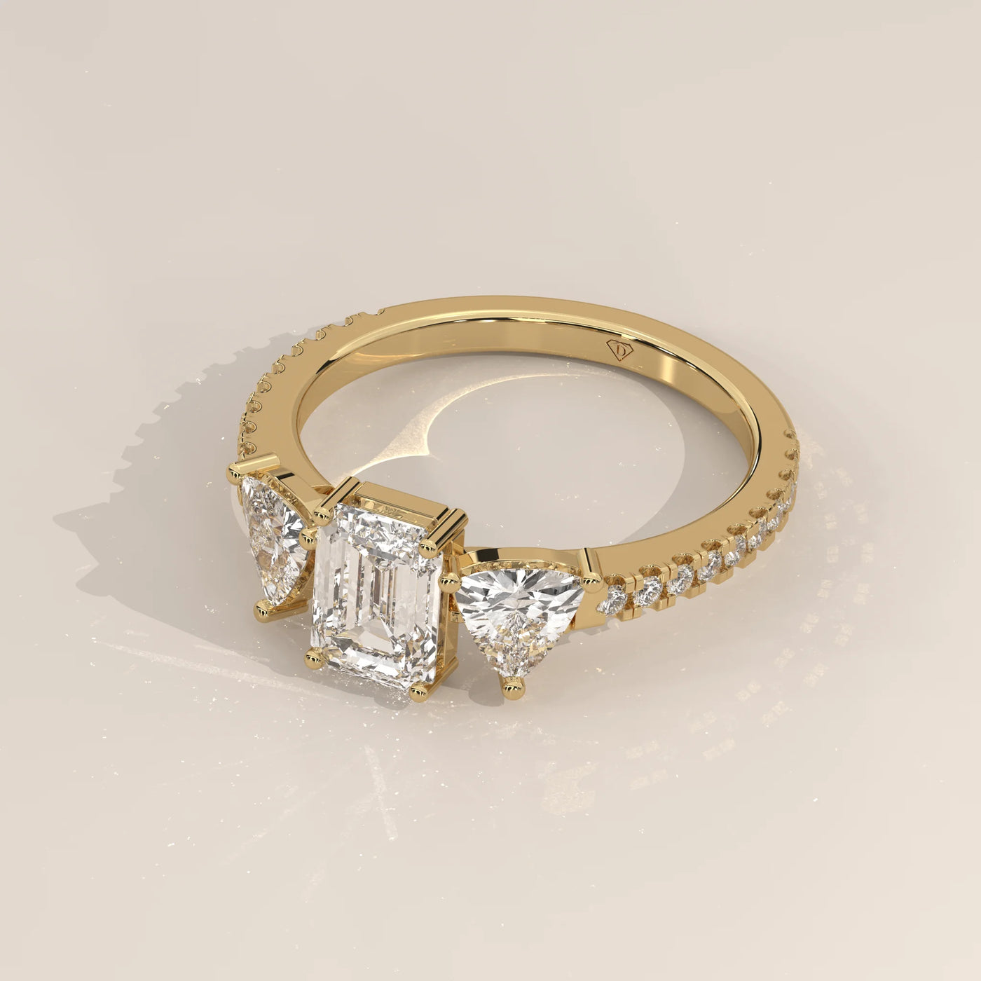 Angle View: Emerald Cut Diamond Ring with Three-Stone Setting in Yellow Gold – Lab Grown – Driona Jewels