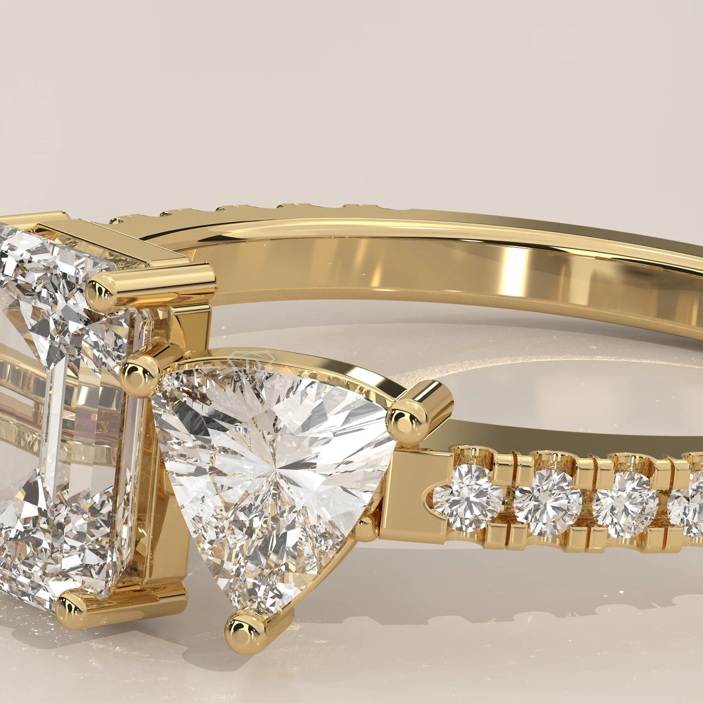 Close-Up: Emerald Cut Diamond Ring with Three-Stone Setting in Yellow Gold – Lab Grown – Driona Jewels
