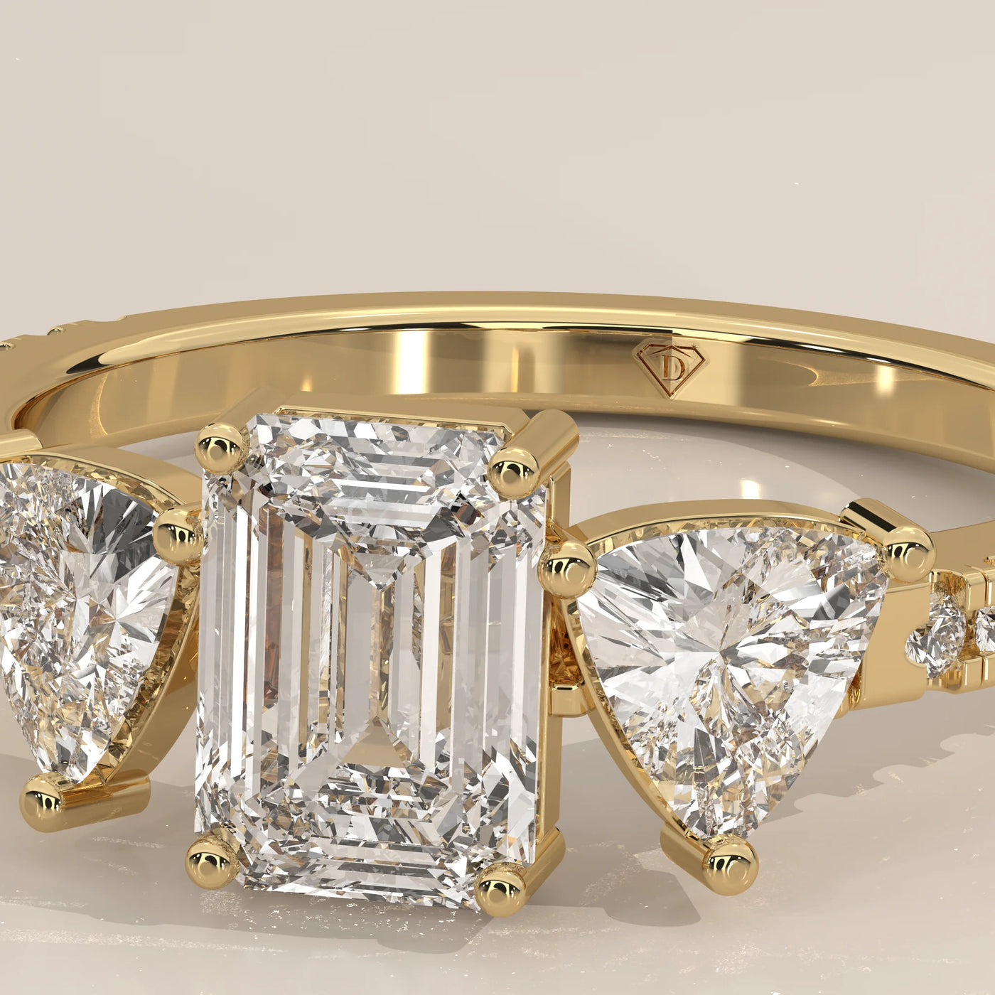 Stone Detail: Emerald Cut Lab Grown Diamonds in Three-Stone Setting – Yellow Gold – Driona Jewels