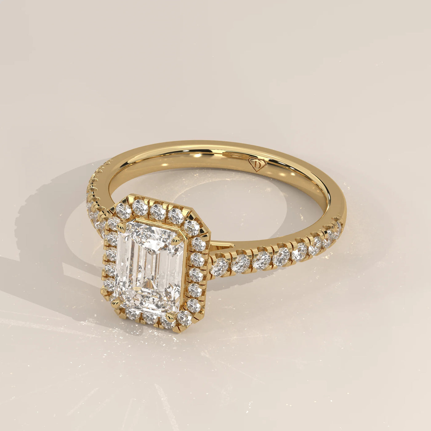 Angle View: Emerald Cut Diamond Engagement Ring with Halo Setting in Yellow Gold – Lab Grown – Driona Jewels