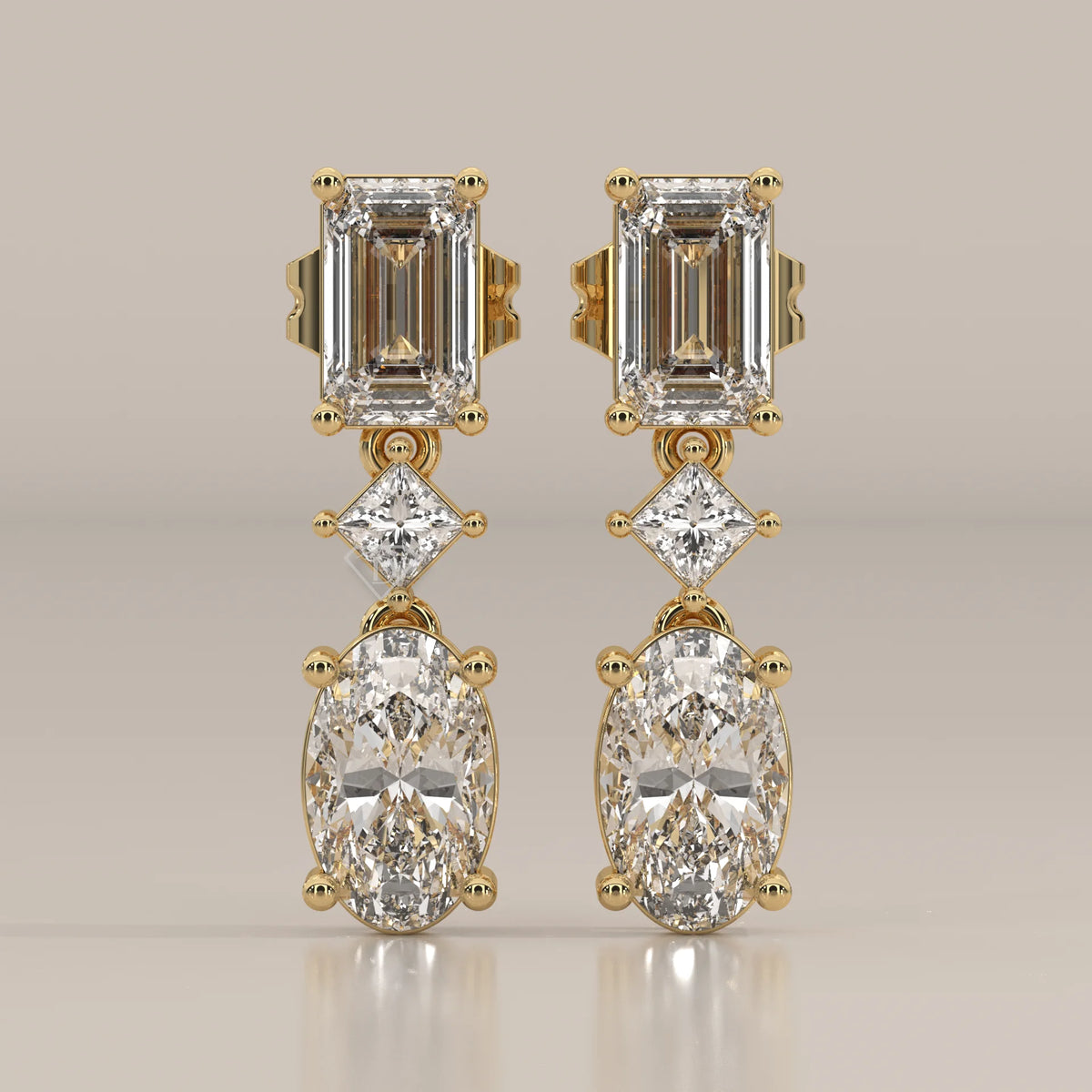 Front View: Emerald Cut Diamond Drop Earrings with Prong Setting in Yellow Gold – Lab Grown – Driona Jewels