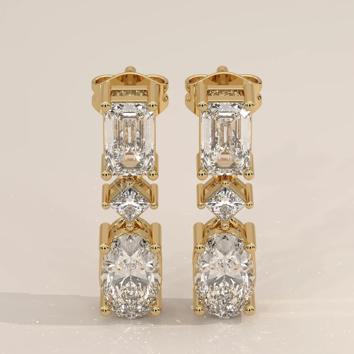 Pair Front View: Emerald Cut Diamond Drop Earrings with Prong Setting in Yellow Gold – Lab Grown – Driona Jewels