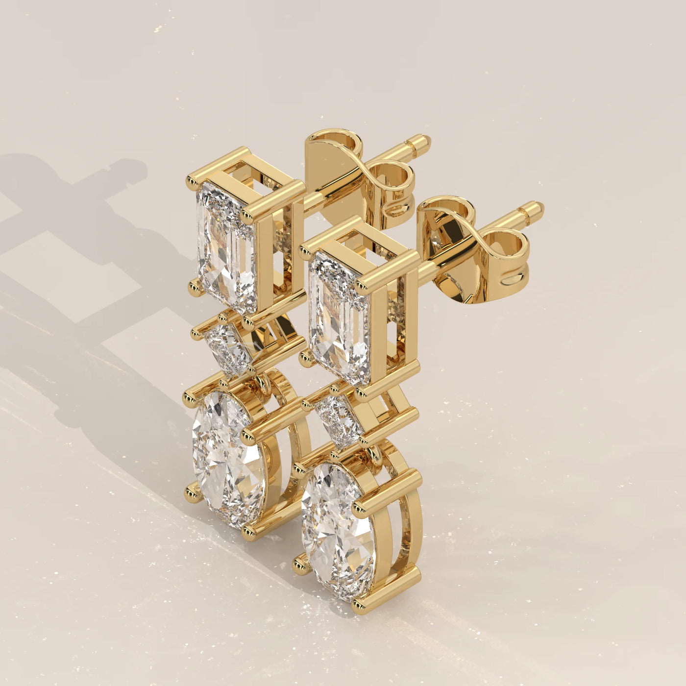 Three-Quarter View: Emerald Cut Diamond Drop Earrings with Prong Setting in Yellow Gold – Lab Grown – Driona Jewels