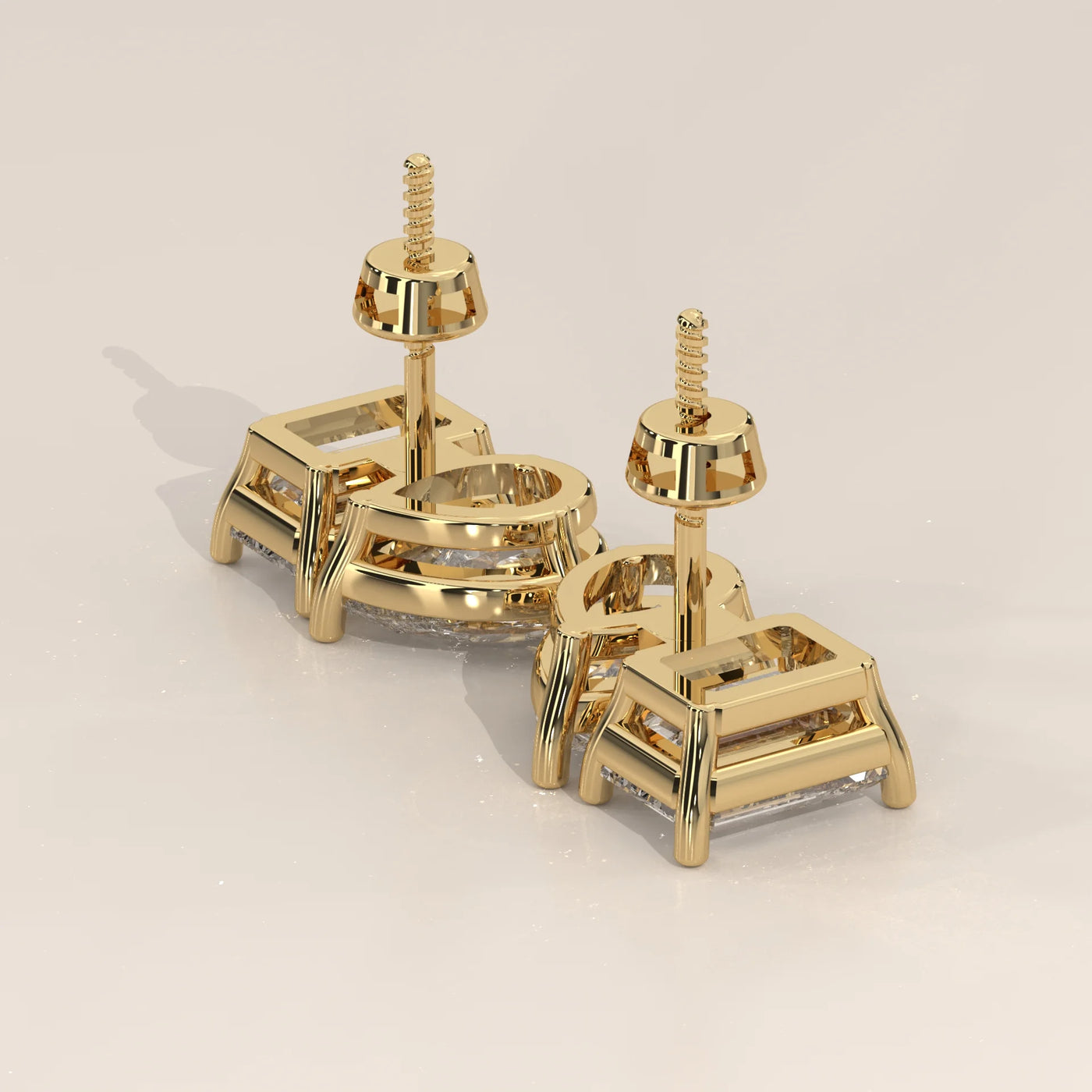 Angle View: Emerald Cut Diamond Stud Earrings with Prong Setting in Yellow Gold – Lab Grown – Driona Jewels