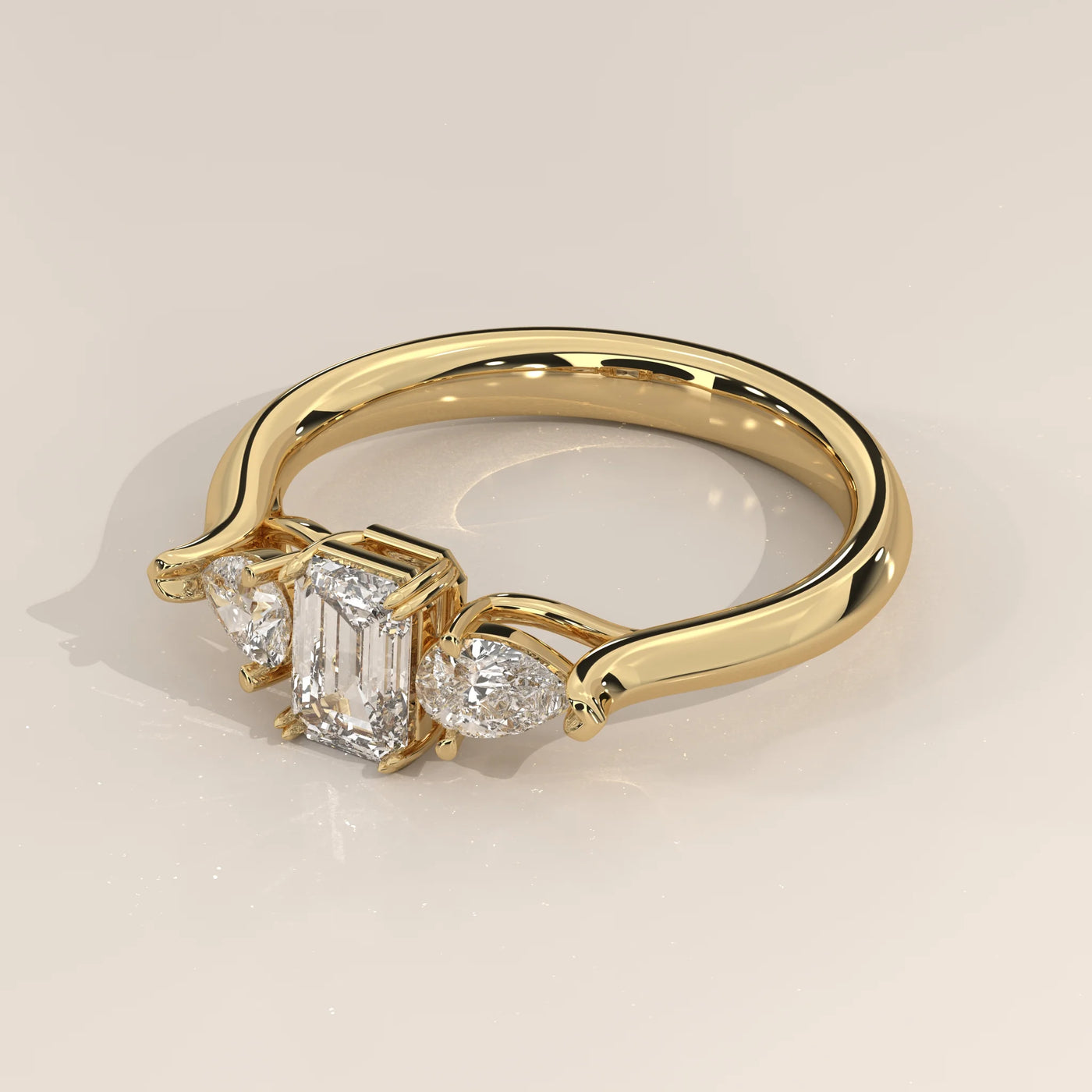 Angle View: Emerald Cut Diamond Ring with Three-Stone Setting in Yellow Gold – Lab Grown – Driona Jewels