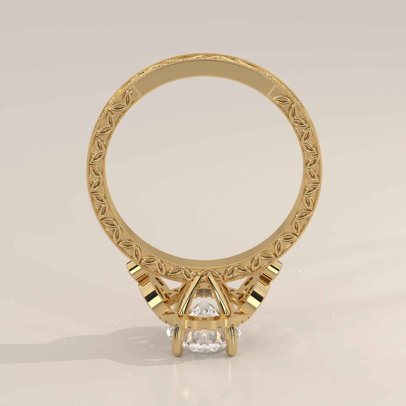 Elegant pear-shaped diamond halo engagement ring in yellow gold.