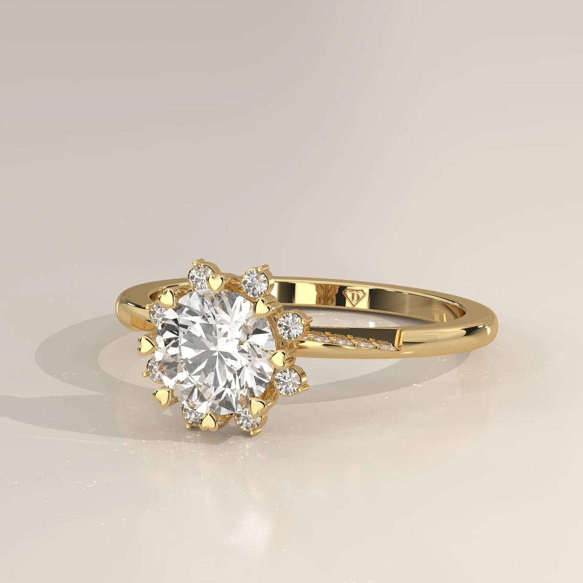 A yellow gold engagement ring with a diamond set in a unique prong setting.