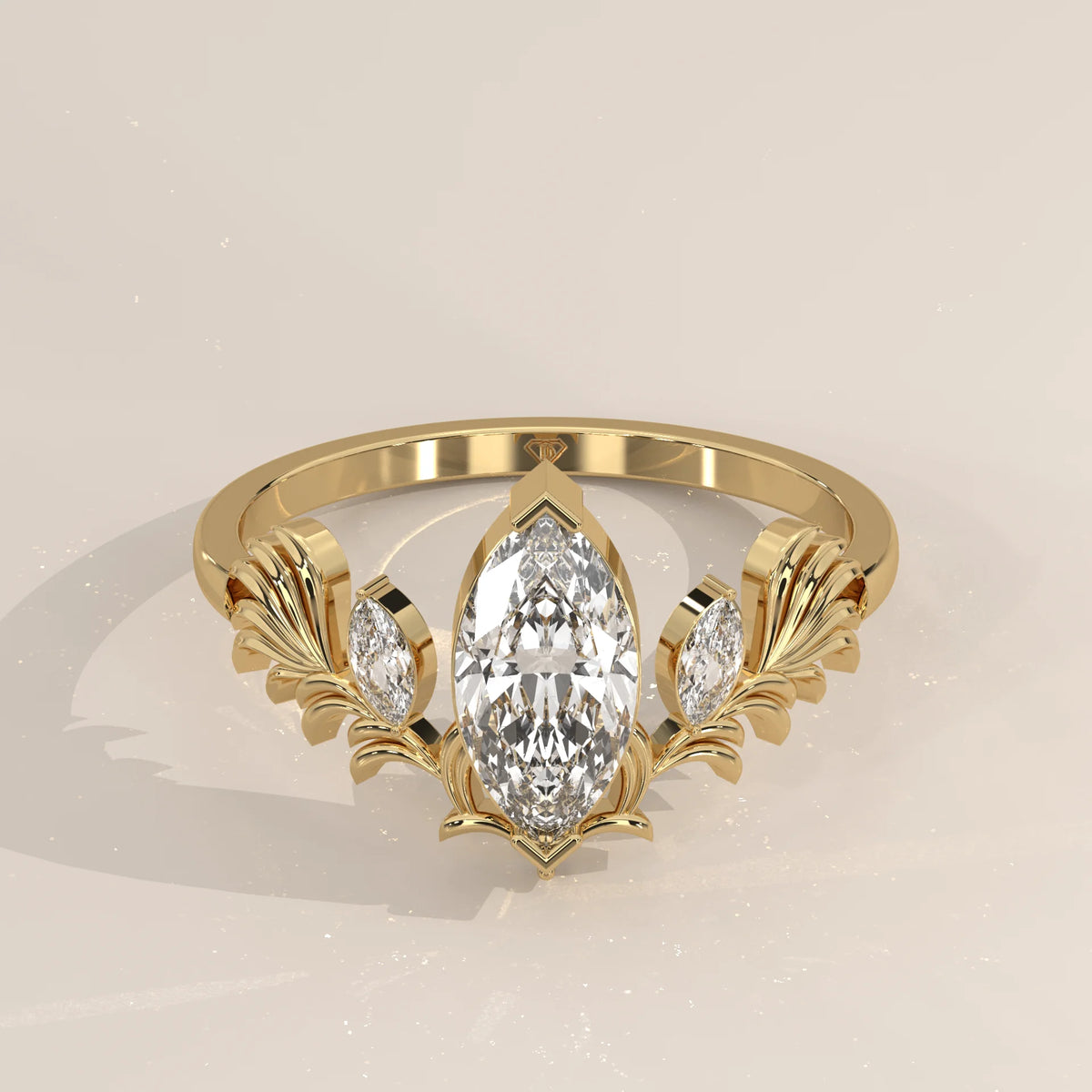 Marquise Lab Grown Diamond Ring with Carved Leaf Wings in yellow gold, shown from the front.
